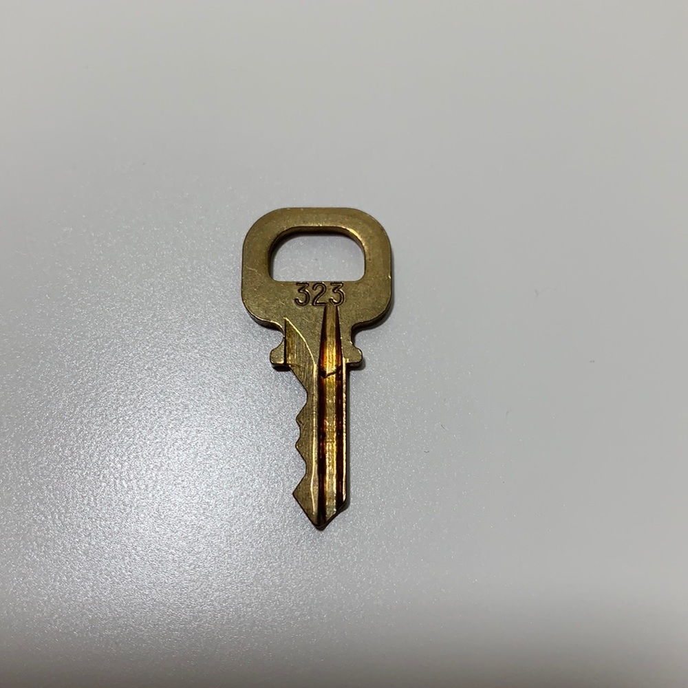 Authentic preowned Louis Vuitton key #323